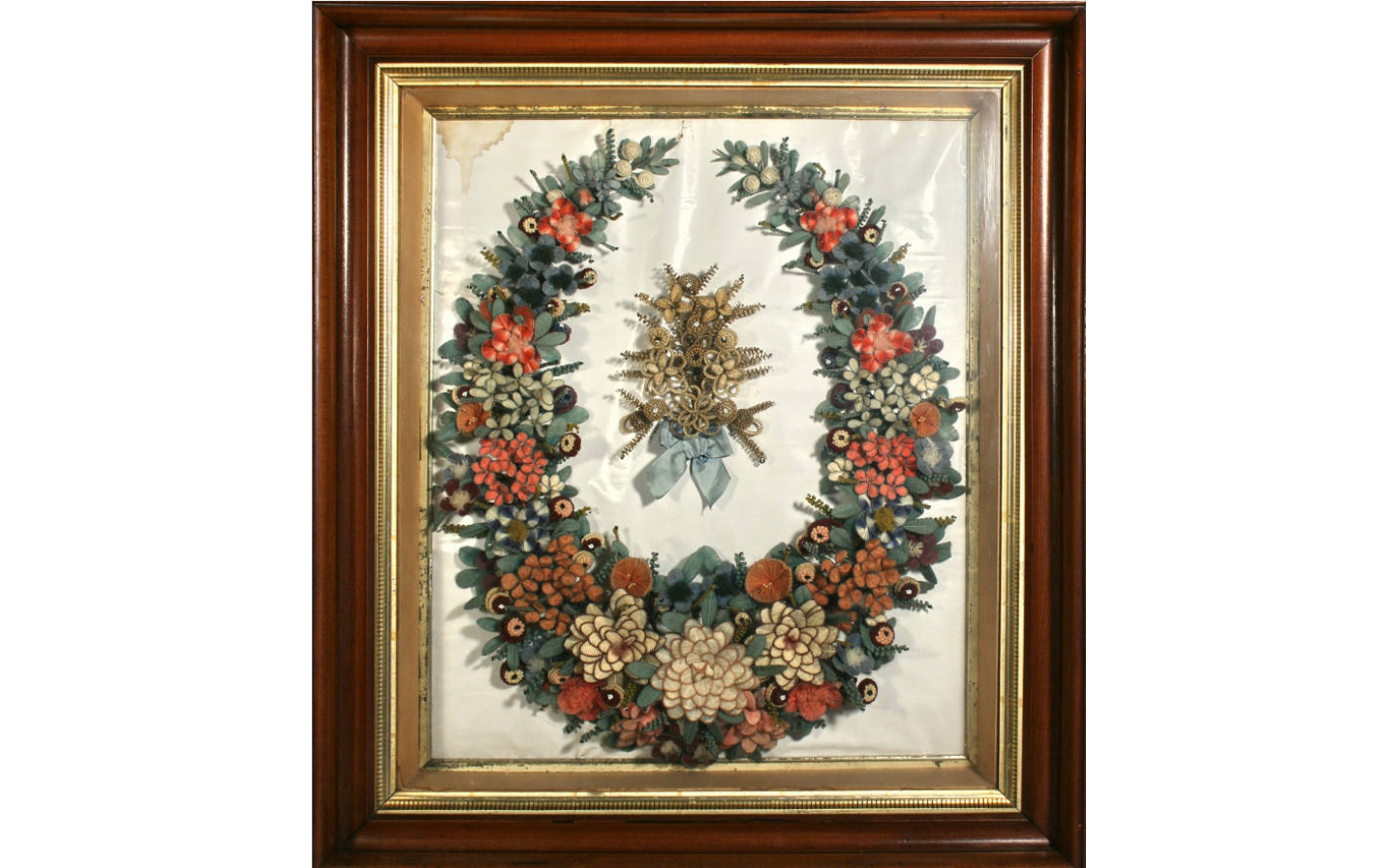 A commemorative hair and yarn wreath